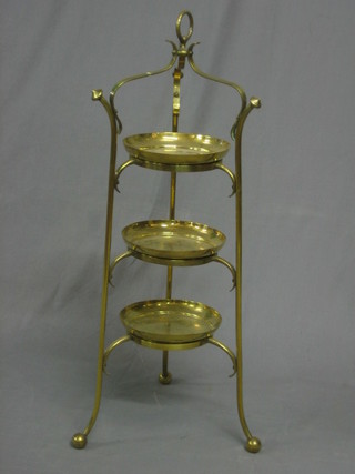 An Art Nouveau brass 3 tier cake stand