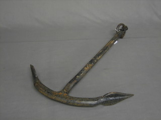 An old iron fishing anchor 28"