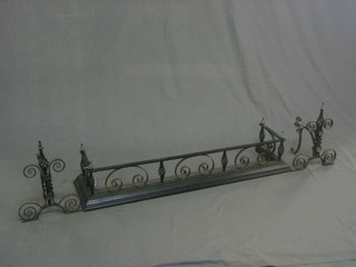A wrought iron and copper fire curb 39"