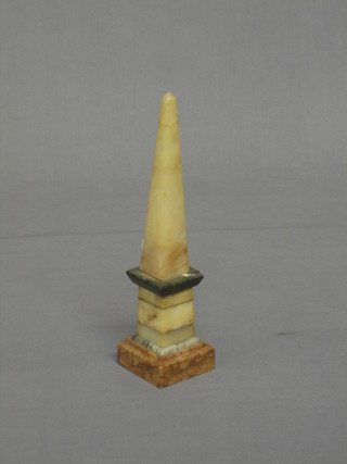 A stone finished obelisk 11"
