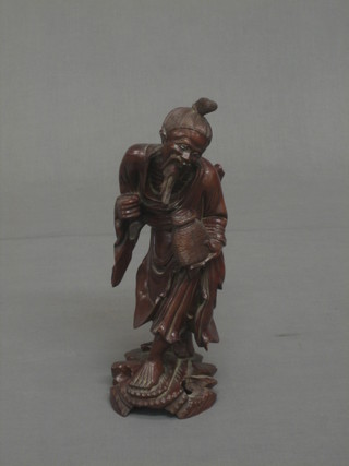 A carved Eastern figure 12"