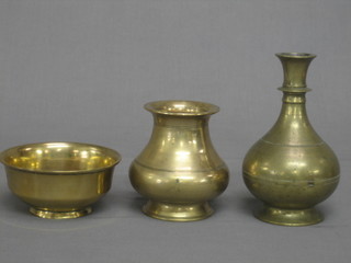 An Eastern brass club shaped vase 7", a circular Eastern vase 4 1/2" and an Eastern bowl 5"