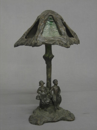 A 1930's Continental spelter table lamp in the form of a standing Dutch boy and girl 15"