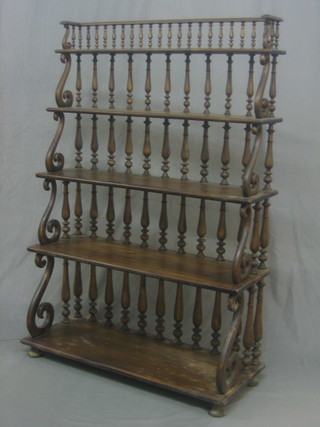 A Regency style mahogany 5 tier bookcase with bobbin turned decoration, raised on bun feet 33" 