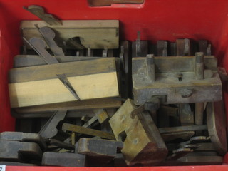 A  collection of 28 various wooden moulding planes and 2 veneer cutters 