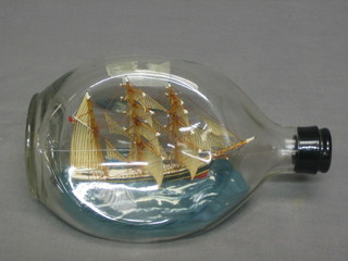 A model of a  clipper sailing ship contained in a Haig Whisky bottle 8"