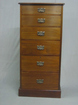 An Art Nouveau walnut pedestal chest of 6 long drawers raised on a platform base 22"