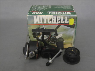 A Mitchell 300 fixed spool fishing reel, boxed