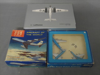 A Caravelle model Pan-Am Lone Star aircraft boxed, a Shuco model set of 4 KLM aircraft and a Lufthansa model JU52/3M boxed