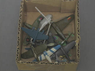 A metal model of an American Helicopter and 11 various other model aircraft
