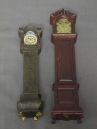 A dolls house wooden longcase clock with opening door and a French style longcase clock