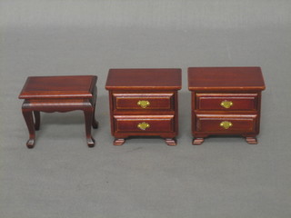 A dolls house rectangular mahogany lamp table 2" and a pair of bedside chests 2"