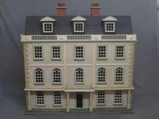 An excellent dolls house in the form of a Georgian Manor House 40" together with a conservatory section 31"