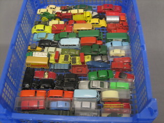 A blue plastic tray of various Matchbox cars