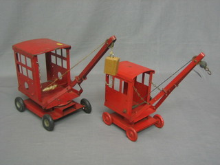 A Triang red pressed model of a crane and 1 other