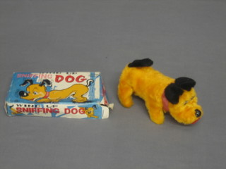 A Japanese wind up model of a dog Cilford Series marked TN