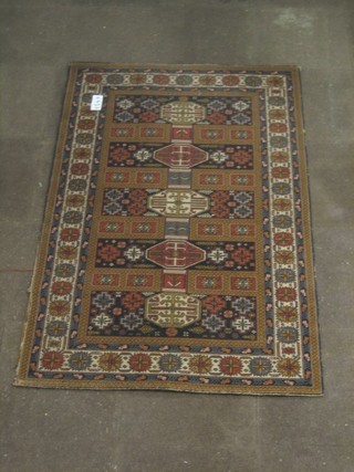A Wilton machine made Persian style blue ground rug with all-over geometric design 72" x 46"