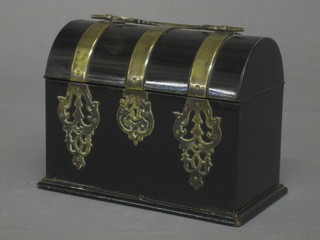 A Victorian ebonised dome shaped trinket box with brass banding and mounts 8"