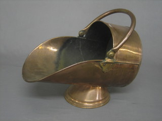 A copper helmet shaped coal scuttle engraved a coronet above A & S