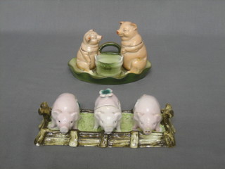 2 19th Century Continental porcelain novelty condiment sets in the form of pigs
