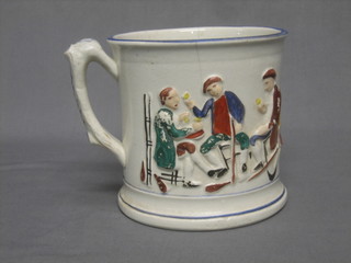 An 18th/19th Century pottery mug, the exterior decorated a tavern scene, the interior with frog (cracked)