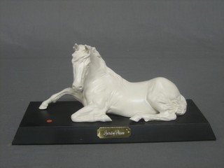 A Royal Doulton figure of a seated horse - Spirit of Peace 10"