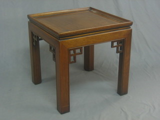 A Georgian style square mahogany lamp table, raised on square tapering supports 21"