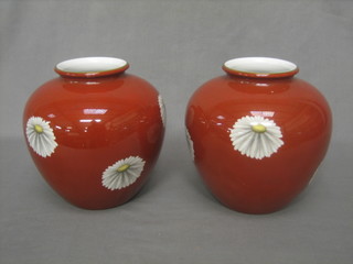 A pair of Noritake globular shaped orange glazed vases 7"