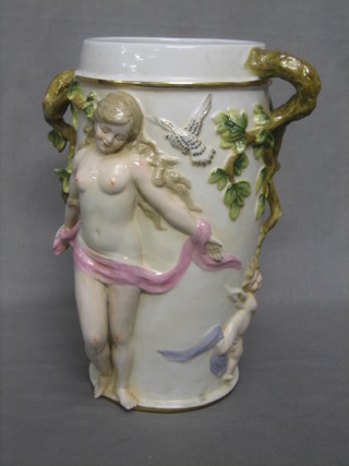 A Meissen style porcelain twin handled vase decorated a naked lady 11"