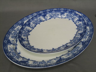 2 blue and white floral patterned oval meat platters