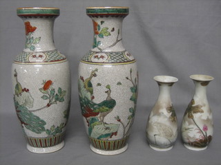 A pair of Oriental club shaped vases with floral decoration the bases with signature mark 7" and a pair of 20th Century Oriental style vases 12"