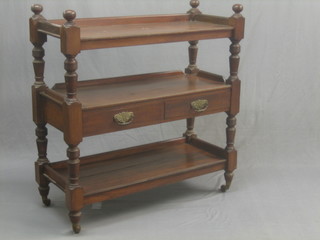 A Victorian mahogany 3 tier buffet, fitted 2 drawers and raised on turned and block supports 42"