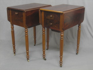 A pair of Victorian flame mahogany drop flap work tables, raised on cabriole supports 21"
