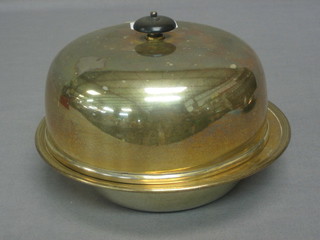 A circular silver plated muffin dish and cover