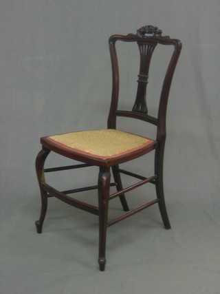 A Victorian mahogany bedroom chair with vase shaped slat back and upholstered seat