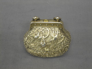A Victorian embossed silver gilt purse decorated birds, London 1874, makers mark TJ 2 ozs