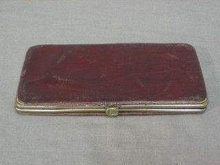 A 19th Century leather spectacle case with embroidered decoration 5"
