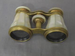 A pair of gilt metal and mother of pearl mounted opera glasses