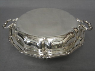 An oval silver plated twin handled entree dish and cover by Elkingtons