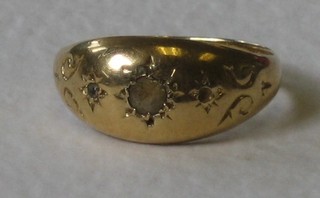 A lady's 18ct gold dress ring set a small diamond