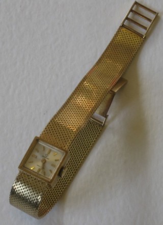 A lady's Gandino wristwatch contained in a 14ct gold case with integral bracelet