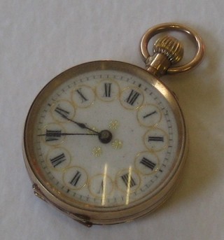 A lady's fob watch with enamelled dial and Roman numerals contained in a 14ct gold case