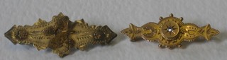 A "gold" bar brooch set a small diamond and a silver bar brooch