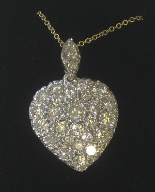 A lady's 18ct gold heart shaped diamond set numerous diamonds approx 1.90ct hung on a fine gold chain