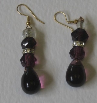 A pair of glass earrings