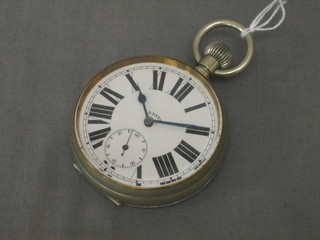A large 8 day pocket watch contained in a plated case