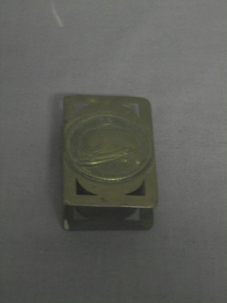 A German pressed metal match slip decorated a pickelhaube
