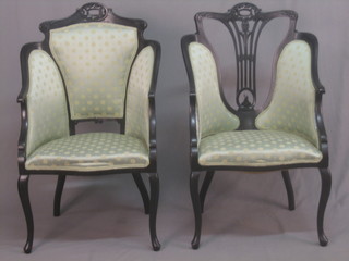 A pair of Edwardian ebonised tub back chairs upholstered in green material, raised on cabriole supports