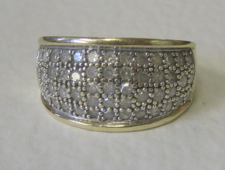 A 9ct gold dress ring set numerous small diamonds approx 1ct