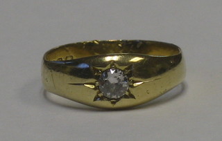 A 22ct gold gypsy ring set a diamond